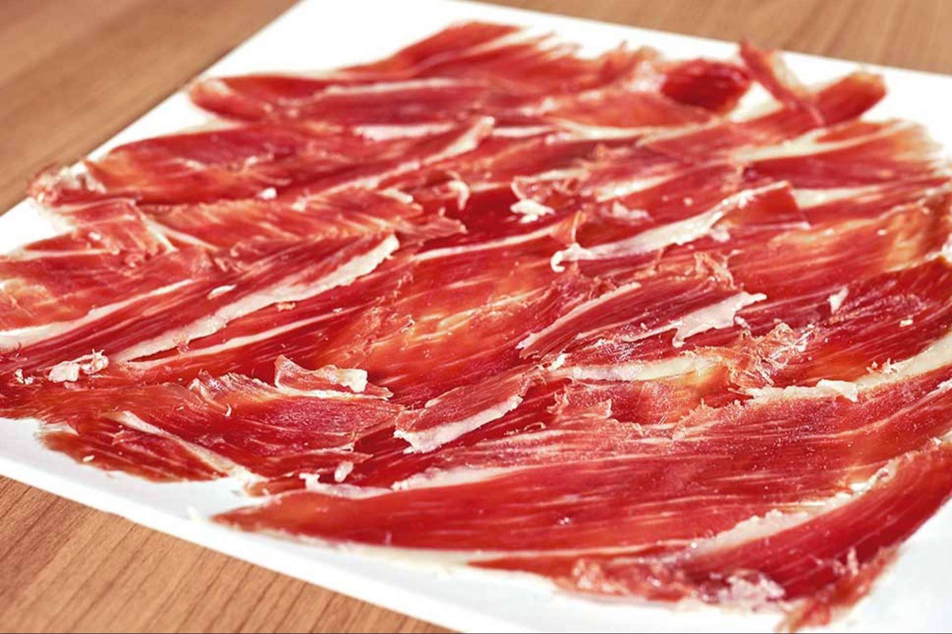 El jamón ibérico y la gamba blanca a domicilio son dos productos gourmet de Bocados de Huelva que no pueden faltar en la mesa durante la navidad